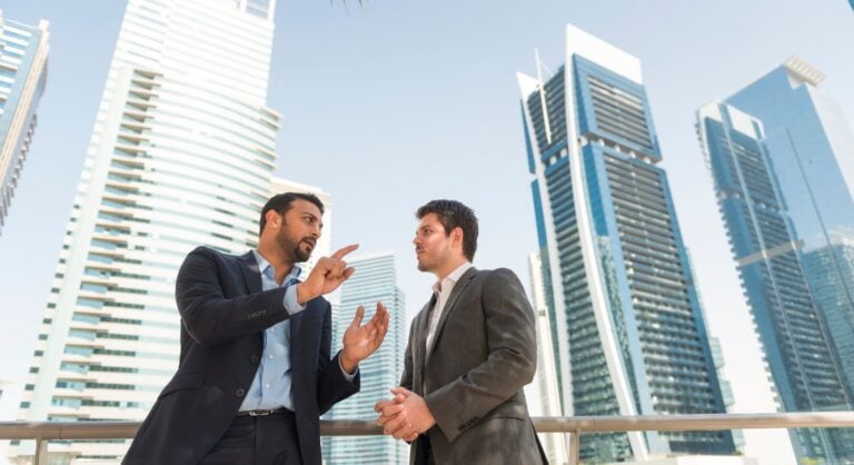 Dubai cityscape and business team